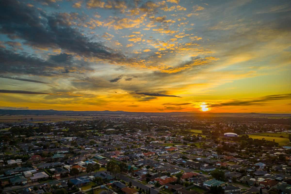 Drone shot of sunrise over suburban Melbourne Australia