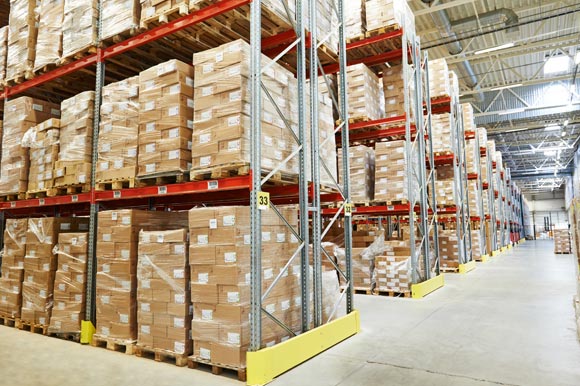 warehouse with stock on transporting pallets