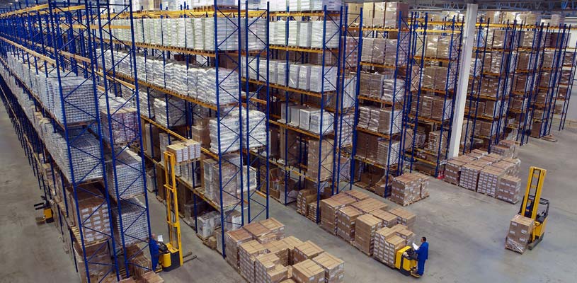 wooden pallets neatly stacked in a warehouse2